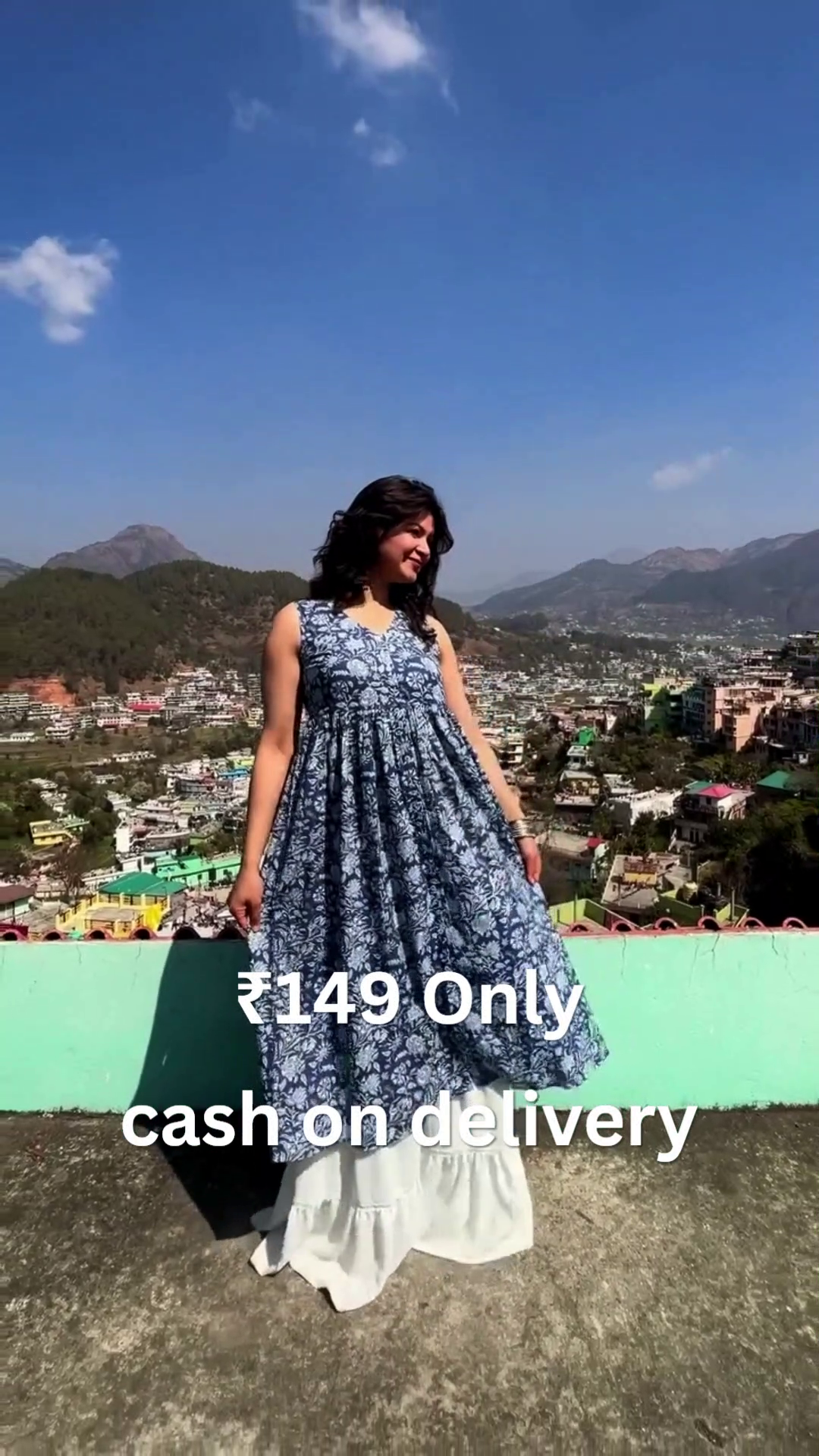 Blue Floral Sleeveless Dress with White Skirt