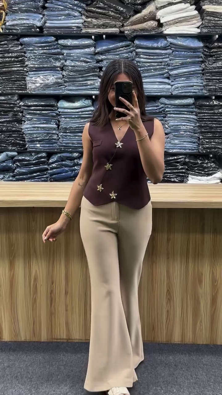 Elegant Sleeveless Top with Flared Pants