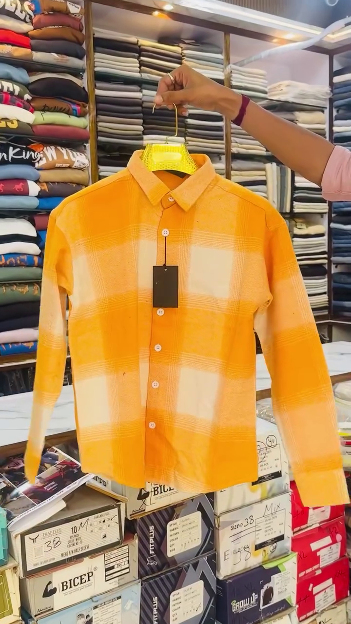 Brighten Your Wardrobe with This Stylish Orange Checkered Shirt