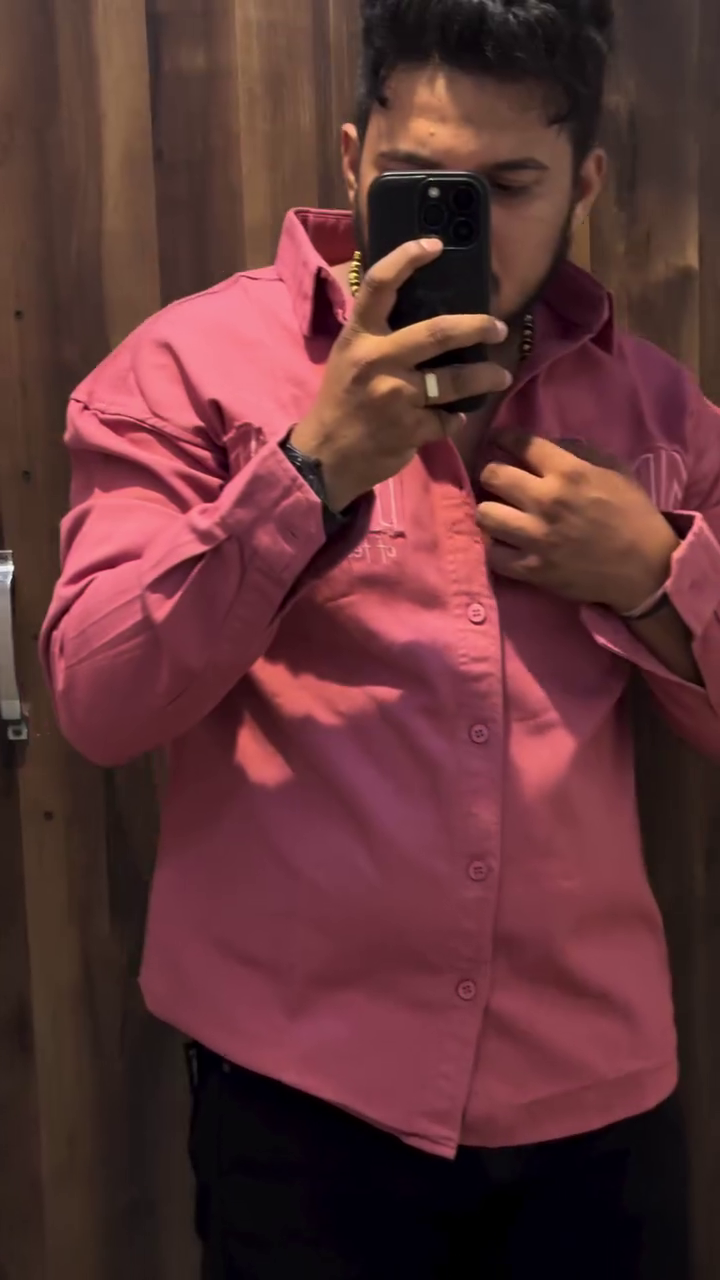 Stand Out in Style with This Statement Pink Shirt